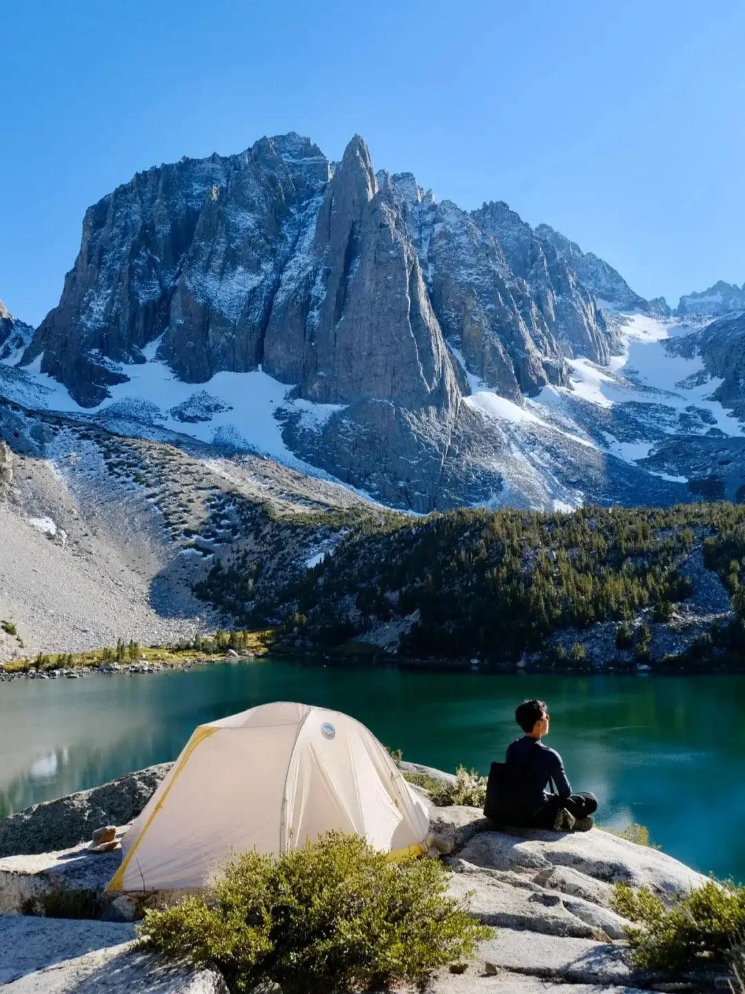 Majestic snow-capped mountain peak over turquoise alpine lake at Second Lake near Pine Creek.